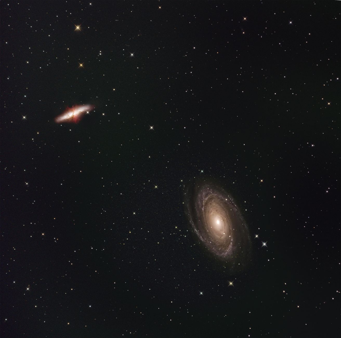 Galáxia espiral cercada por estrelas em uma imagem ilustrativa do espaço profundo